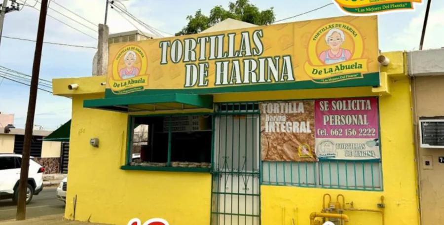 Fachada amarilla de la Sucursal Garmendia (Matriz) de Tortillas de Harina de la Abuela en Hermosillo